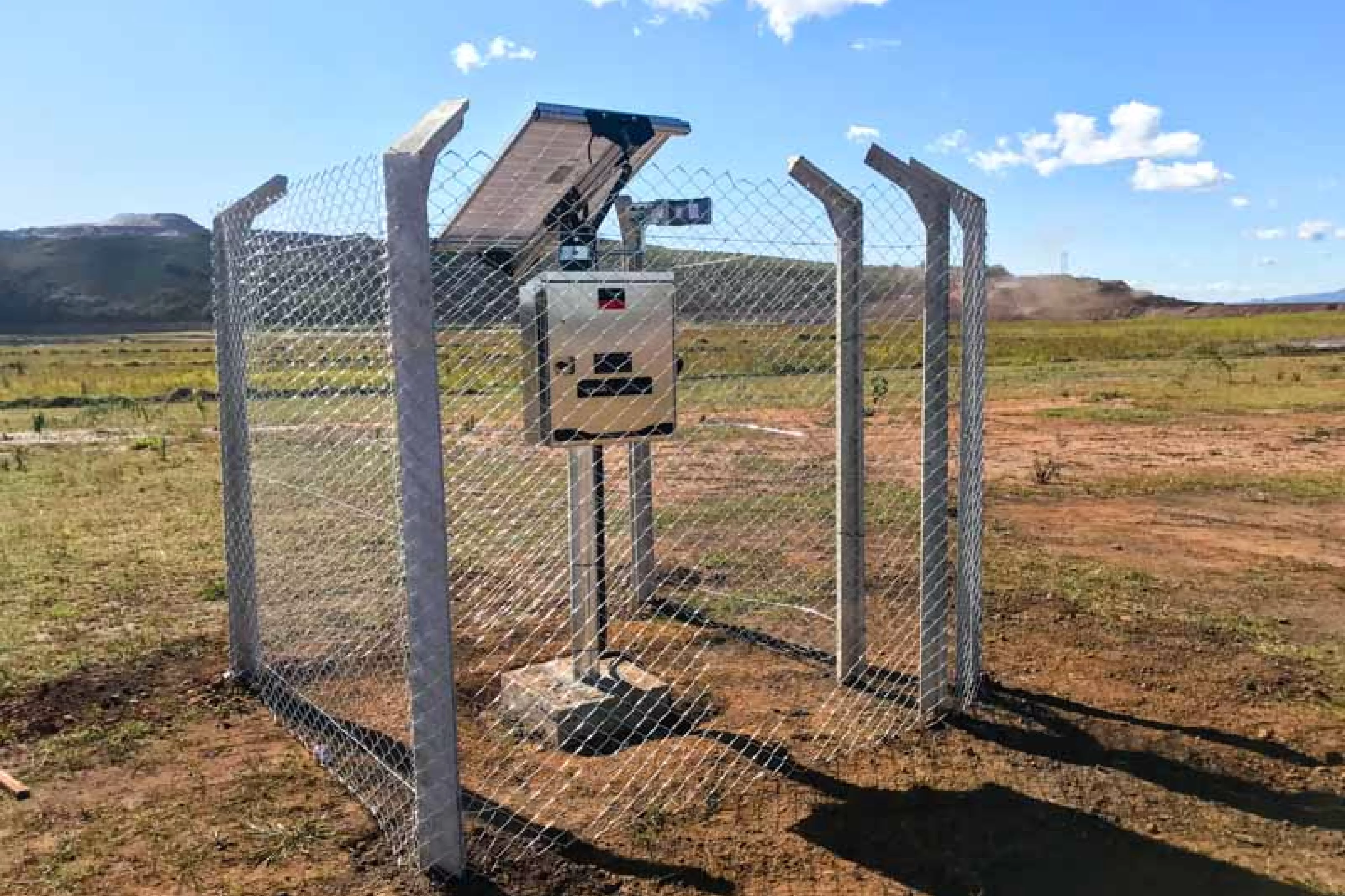metal fence around monitoring equipment