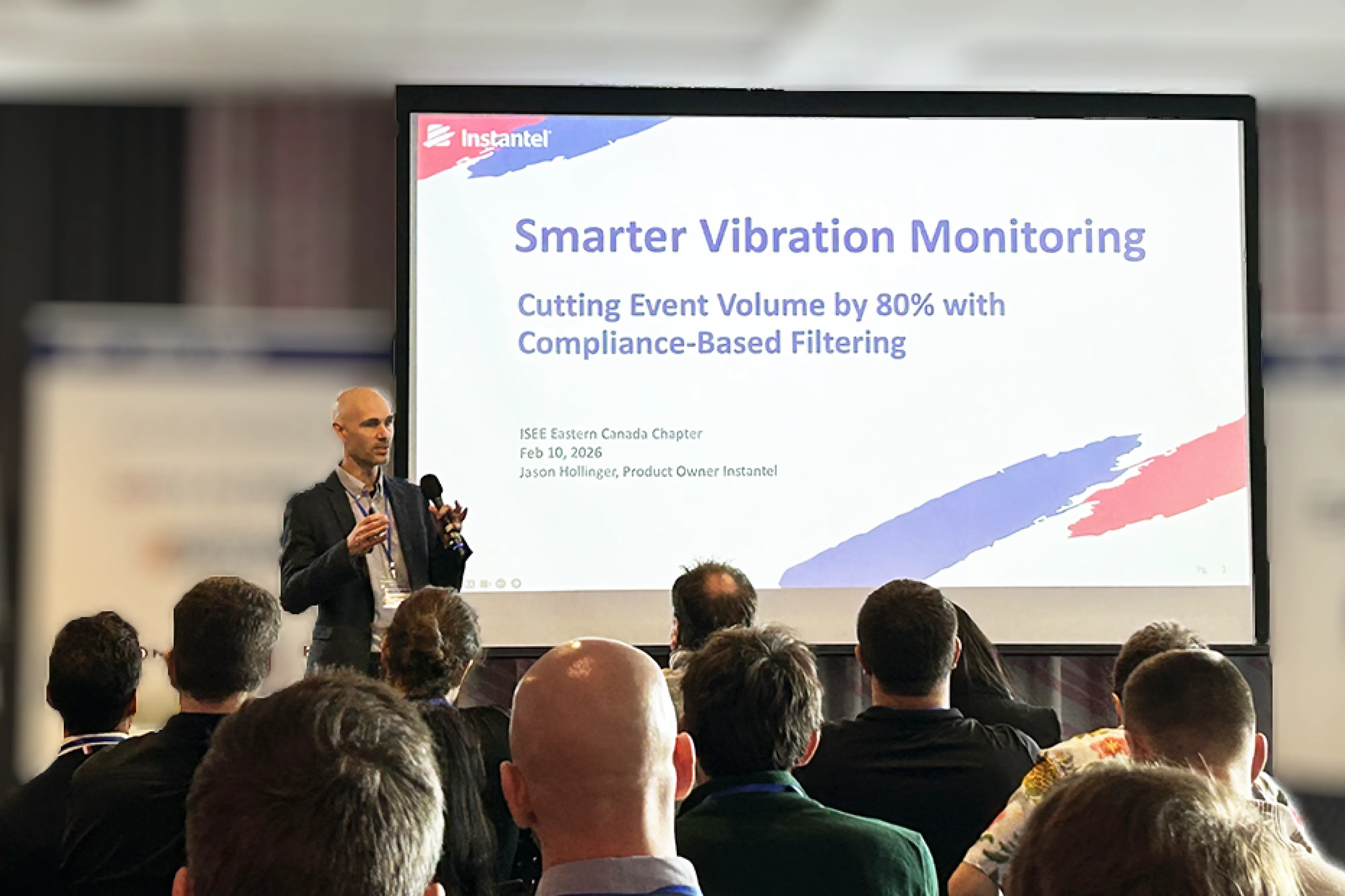 A speaker presenting Smarter Vibration Monitoring to attendees at ISEE Eastern Canada Chapter conference.