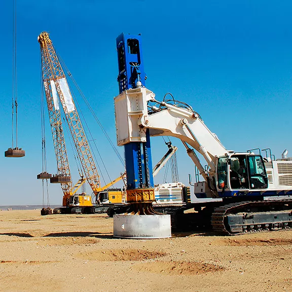 Dynamic compaction machines and cranes