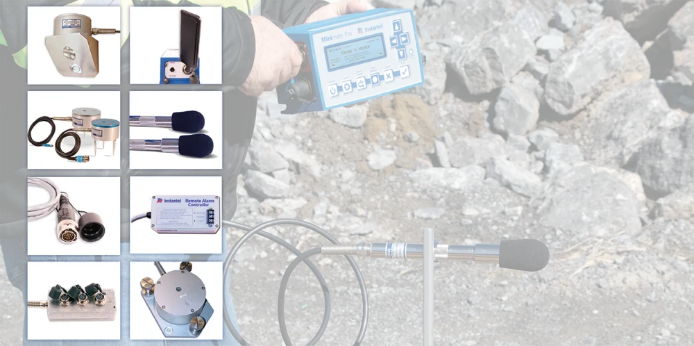 Assorted Instantel sensors with a Minimate Pro and microphone in the background