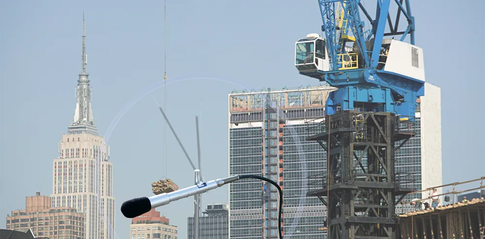 An image of the New York Skyline and a sound level microphone