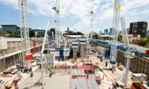 View across construction site with cranes