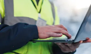 A worker using a laptop