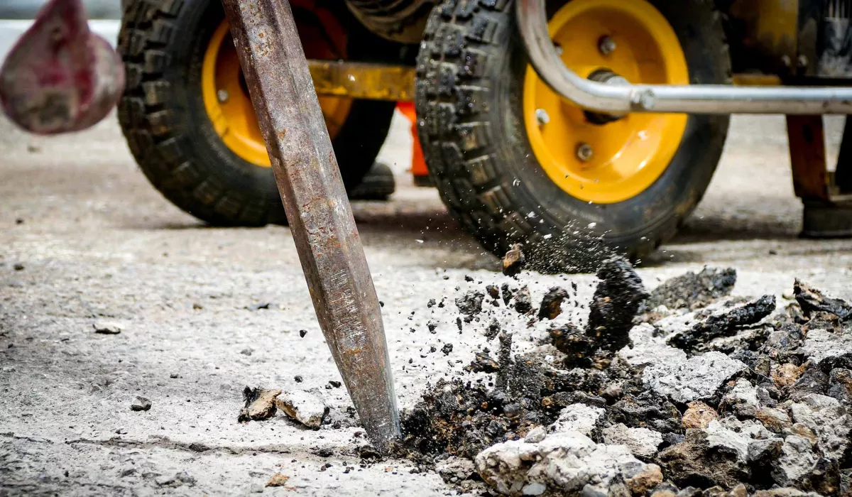 Close up of jackhammer during road construction