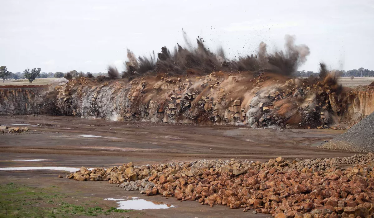 Quarry cliff explodes during blasting